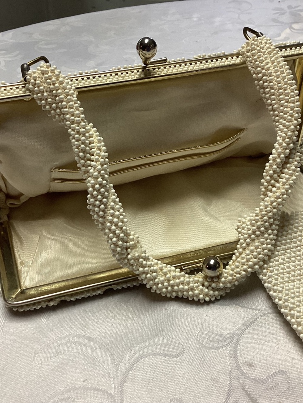 Beaded bag, white braided strap with change purse